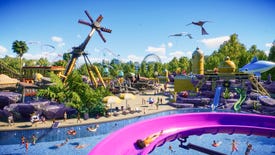 A themepark in Planet Coaster 2 on a sunny day with a purple slide in the foreground and a bunch of spinny rides in the distance